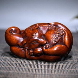 Chinese collection of hand-carved boxwood nine-tailed fox statue ornaments, with collection value
