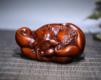 Chinese collection of hand-carved boxwood nine-tailed fox statue ornaments, with collection value