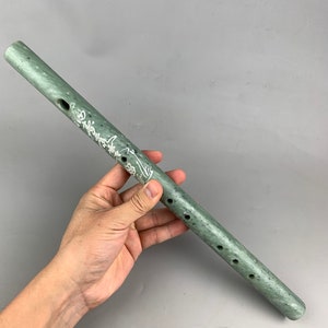 Hand-carved jade flute ornaments made by Chinese antiques, exquisite in shape, worthy of collection