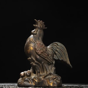 A rare and exquisite handcrafted antique Chinese bronze rooster figurine.