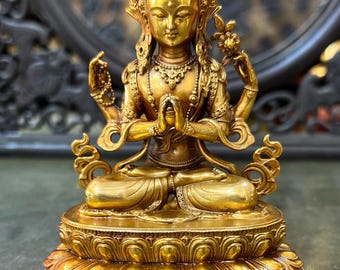 Exquise et rare statue de Bouddha Tara à quatre bras en cuivre pur, fabriquée à la main à partir d'antiquités chinoises.