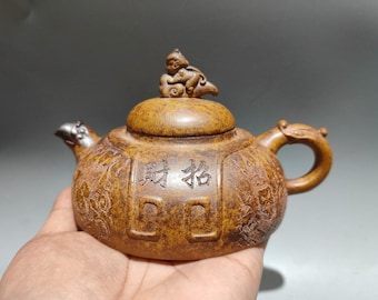 Wykwintny chiński antyczny, ręcznie malowany gliniany dzbanek do herbaty, pomyślna i szczęśliwa ozdoba z fioletowej gliny.
