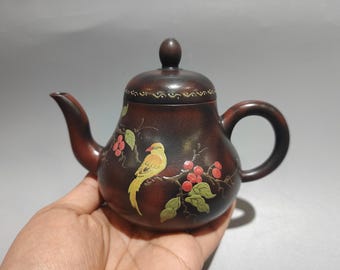 Exquisite Chinese antique clay-painted teapot with bird and flower design, a Zisha (purple clay) teapot ornament.