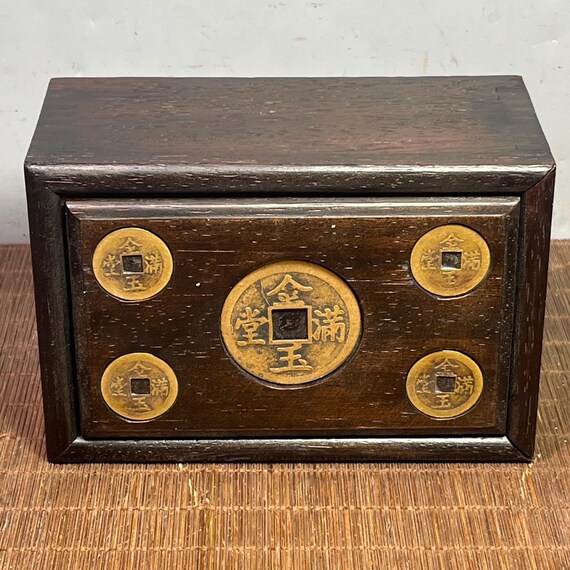 Chinese antique, exquisitely hand-carved rosewood jewelry box inlaid with copper, symbolizing abundance and wealth.