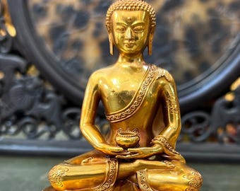 Exquisita y rara estatua del Buda de la Medicina de cobre puro, elaborada artesanalmente con materiales chinos antiguos.