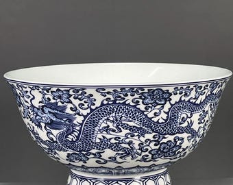 Exquisite Chinese antique blue and white porcelain bowl with dragon design, hand-painted.
