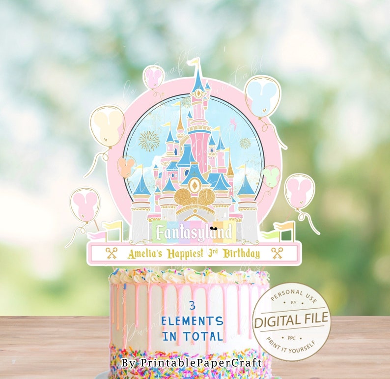 May include: A pink and blue cake topper featuring a fairytale castle with gold accents and a banner that reads "Fantasyland Amelia's Happiest 3rd Birthday". The topper is surrounded by pastel-colored balloons with Mickey Mouse ears.