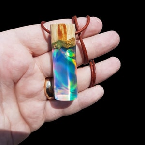 Discover the Dazzling Beauty of Aurora Borealis and Opal Necklaces - Perfect for Men and Women! Shop Our Rainbow and Iridescent Collection