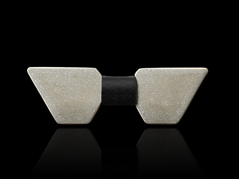 Sleek and stylish, our Modern Bowtie is crafted from premium concrete, offering a contemporary accessory that epitomizes modern elegance.