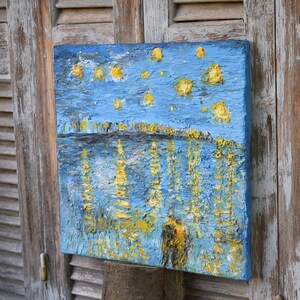 Textured painting : The Starry Night.
It's a textured painting with acrylics and stucco on canvas.
An alternativity way to present  the paint of a "Starry Night Over The Rhone" of Vincent Van Gogh.
