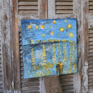 Textured painting : The Starry Night.
It's a textured painting with acrylics and stucco on canvas.
An alternativity way to present  the paint of a "Starry Night Over The Rhone" of Vincent Van Gogh.