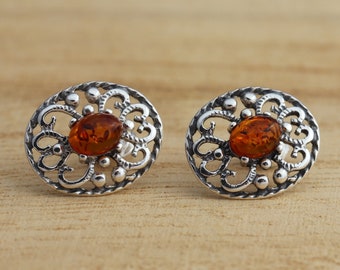 Orecchini a bottone con sole fiammeggiante in vera ambra baltica da donna in argento sterling, ricco colore cognac