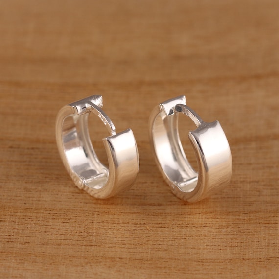 Plain silver huggie best sale earrings