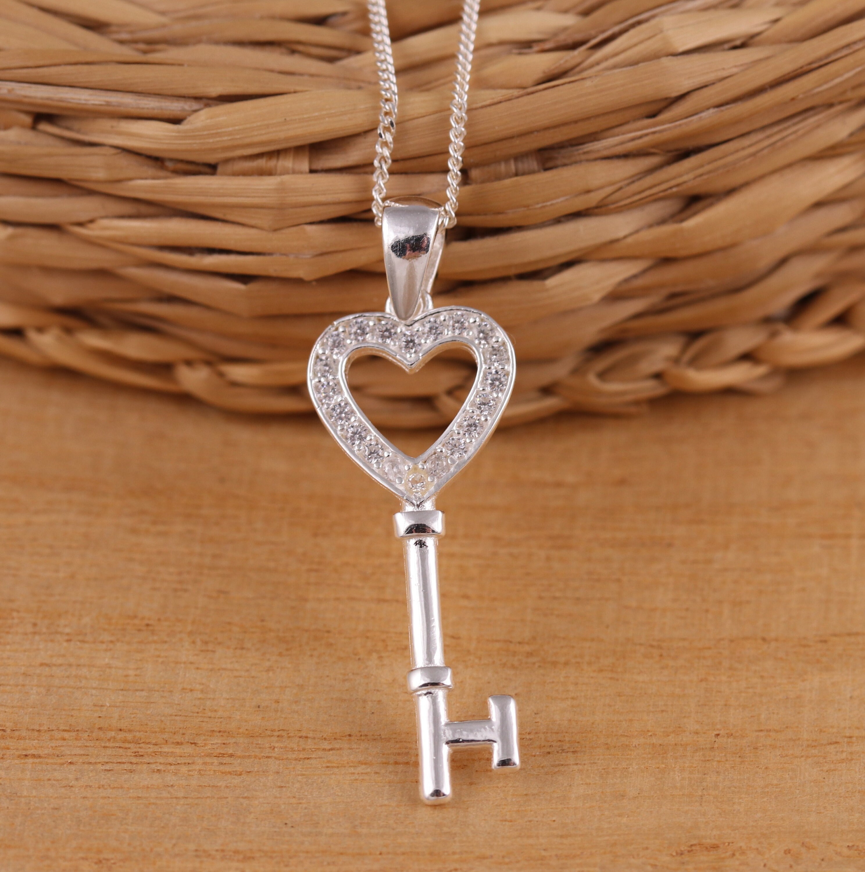 Open heart shop key necklace