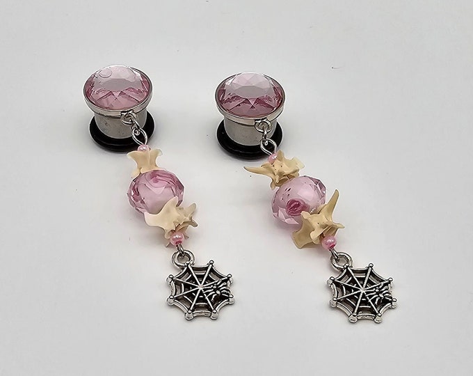 Pink snake vertebrae plug earrings