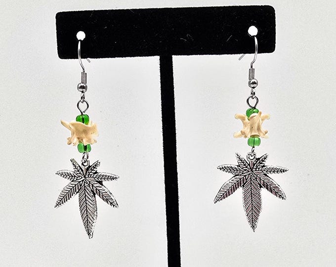 Pot leaf rattlesnake vertebrae earrings