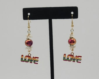 Rainbow love snake bone earrings, LGBTQ pride, love pride earrings, real bone jewelry, snake vertebrae vulture culture earrings