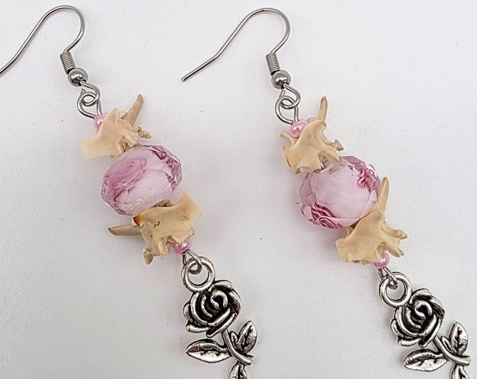 Pink rose and rattlesnake vertebrae earrings