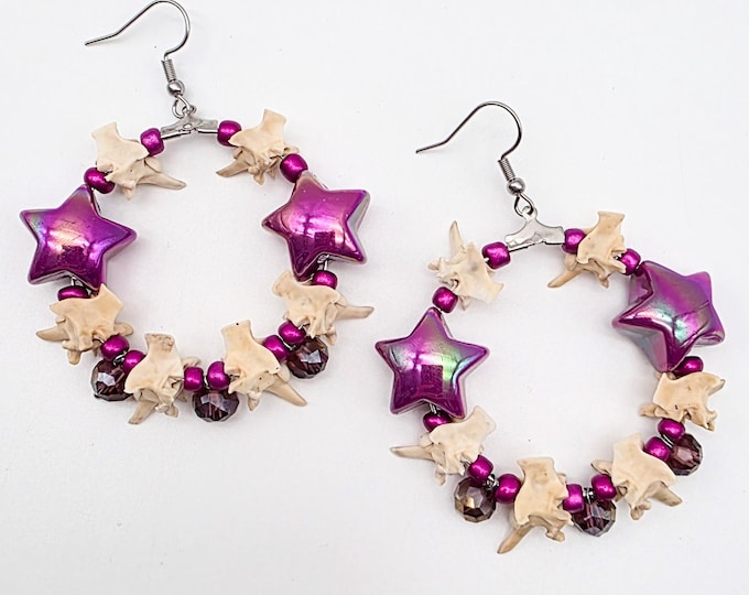 Purple star and rattlesnake vertebrae hoop earrings