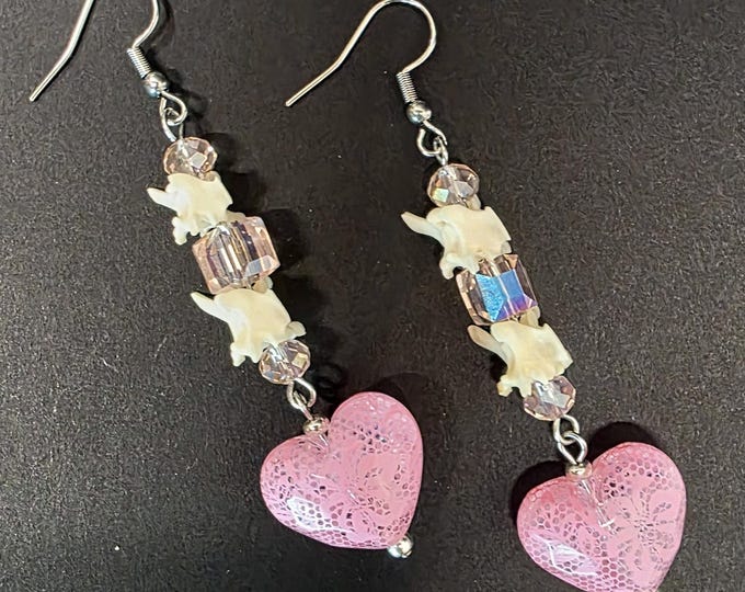 Pink heart and rattlesnake vertebrae earrings