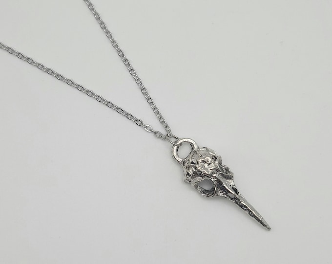 Silver bird skull charm necklace
