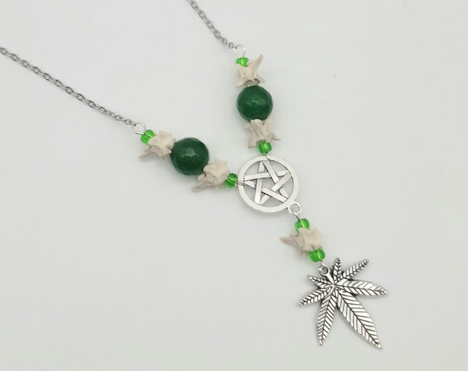 Pot leaf and rattlesnake vertebrae necklace