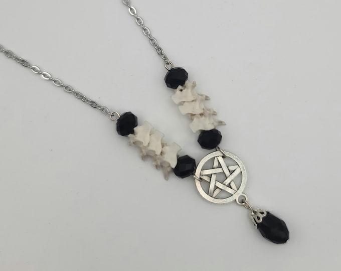 Black pentagram and snake vertebrae necklace
