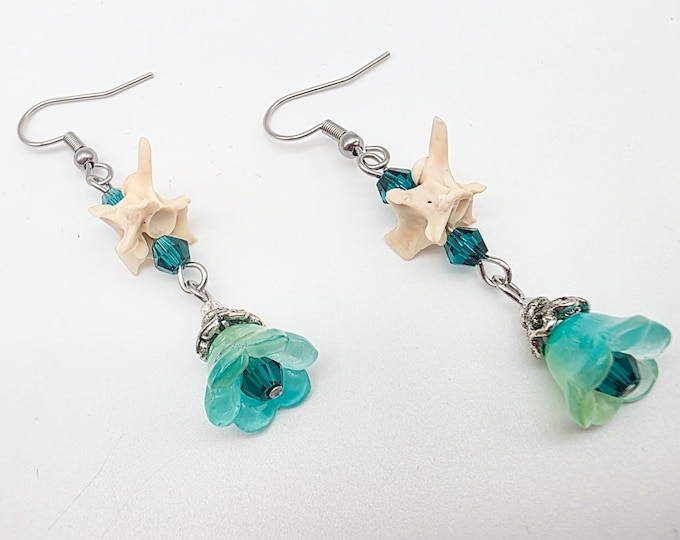 Teal flower and rattlesnake vertebrae earrings