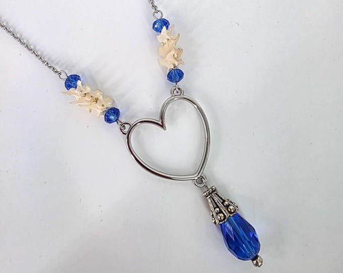 Blue heart snake vertebrae necklace
