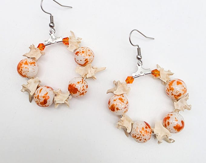 Orange rattlesnake vertebrae hoop earrings