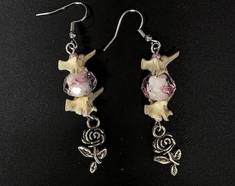 Pink rose and rattlesnake vertebrae earrings