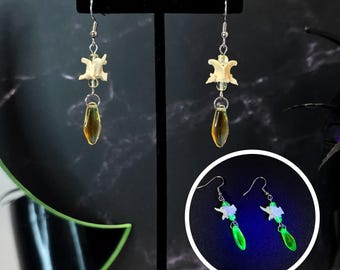 Orange uranium glass and snake vertebrae earrings