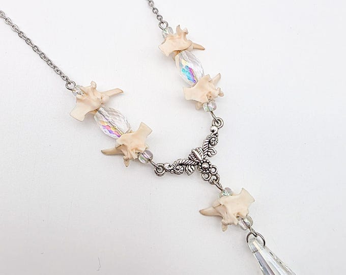 Crystal and rattlesnake vertebrae necklace