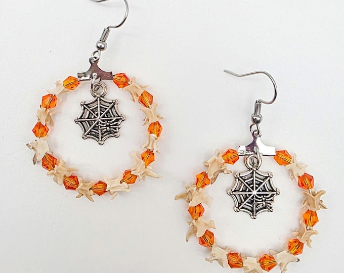 Orange rattlesnake vertebrae and spider charm hoop earrings
