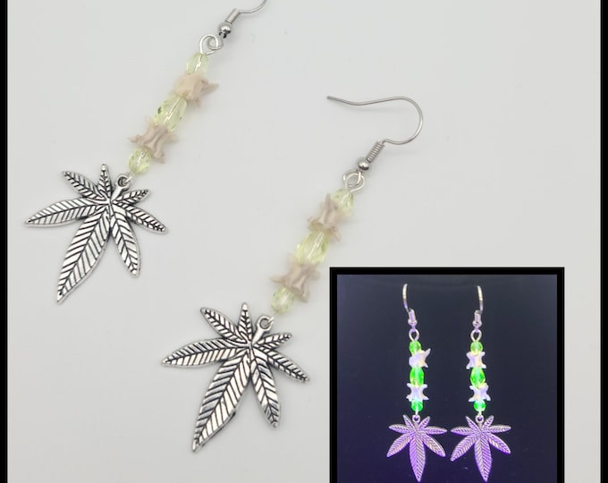 Pot leaf uranium glass and snake vertebrae earrings