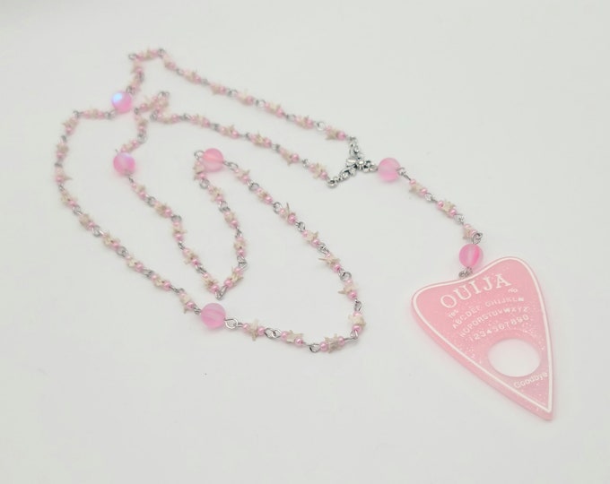 Pink planchette snake bone rosary