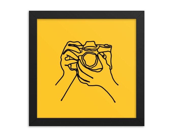 Featured listing image: The Camera Print | The perfect gift for photography lovers and journalists | Line drawing on sunshine yellow | 10 x 10 in Black Wood Frame