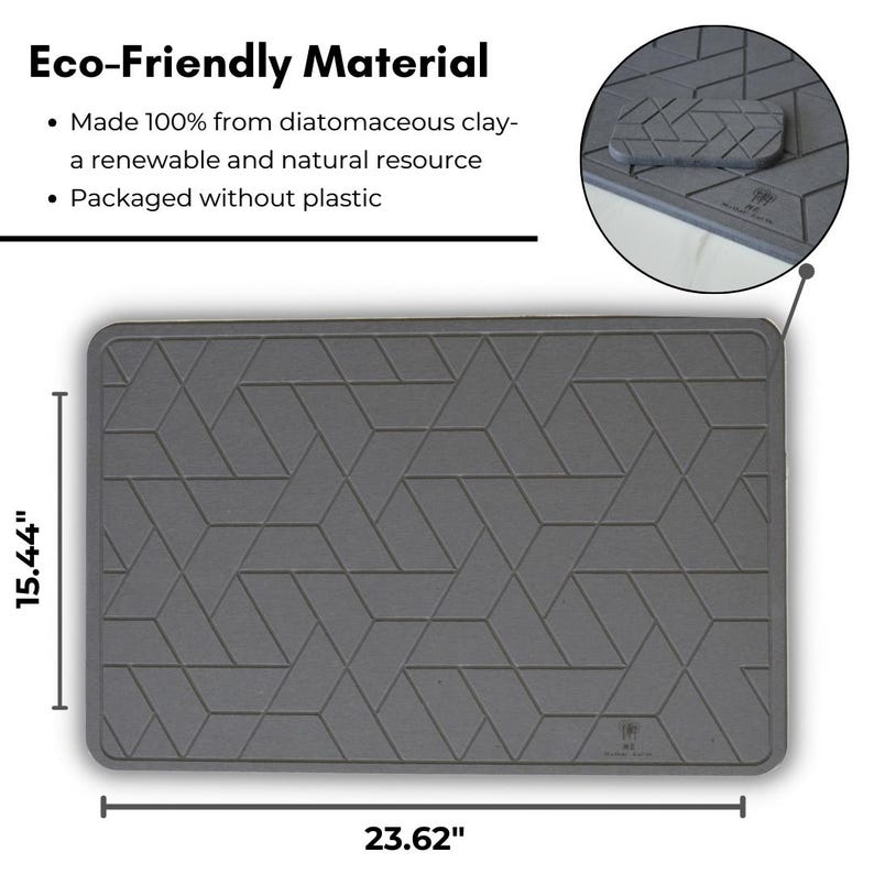 May include: Grey rectangular kitchen mat made from diatomaceous clay. The mat measures 39.2 cm by 60 cm and features a geometric pattern. The mat is made from a renewable and natural resource and is packaged without plastic.