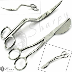 May include: Two pairs of stainless steel scissors with curved handles. The scissors are designed for use in the kitchen or for crafting.