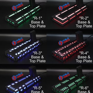 May include: A collection of six black base and top plates with integrated LED lighting. Each plate, labeled "R-1" through "R-6", features a unique LED pattern in colors like green, red, and blue. The "HALO MACHINE" logo is visible.