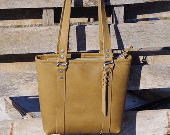 Shoulder bag/purse/bag. Made with Khaki Desert Brown 100 percent rustic full grain leather. Made in the USA.