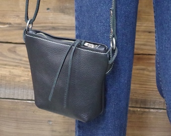 Leather crossbody/shoulder bag. Black full grain leather, soft suede inside. Made in the USA.