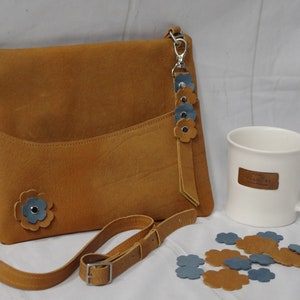 Leather crossbody bag/purse. Buckskin full grain leather. Soft suede inside. Zipper closure and side pocket. One of a kind. Made in the USA.