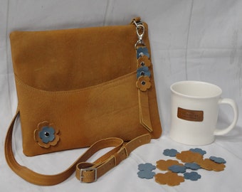 Leather crossbody Hobo bag. Buckskin full grain leather. Soft suede inside. Zipper closure and side pocket. One of a kind. Made in the USA.