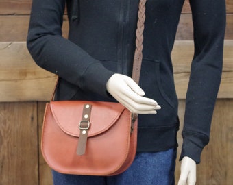 Crossbody leather shoulder bag/purse.  Beautiful brown two tone leather bag. Braided crossbody strap. Magnet closure.