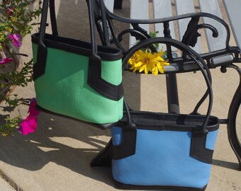 Colorful leather bag/tote/purse. Full grain 100% cow hide leather. Zipper top. Cotton lined with pocket. Handmade in the USA.