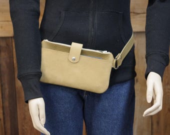 Lovely leather crossbody fanny pack. Great two tone soft leather adjustable bag to wear around your waist or body. Handmade in the USA.