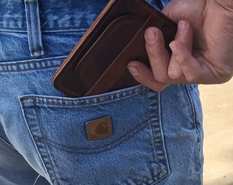 Great leather wallet. 100 percent cow hide. Card holder, money holder. Envelope wallet for men or women. Great gift idea. Made in the USA.