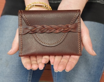 Beautiful rich brown leather clutch/wallet. Full grain leather braided closure. Minimalist wallet. Great gift idea. Made in the USA.