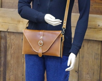Leather crossbody bag. Beautiful brown pullup leather with all natural suede inside.  Made in the USA.
